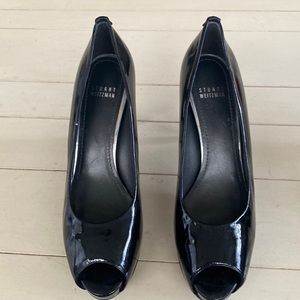 Stuart Weitzman open toe pumps in size 9.5 black patent leather.
